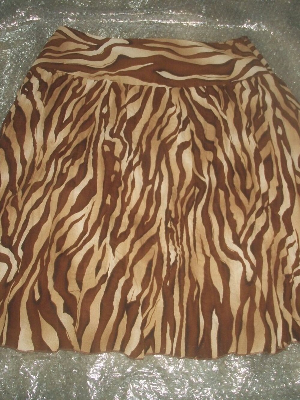 womens lined flare skirt.Tiger pattern. knee or below length.size small